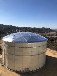 Epoxy Bolted Water Tank with Aluminum Dome Roof on a hillside