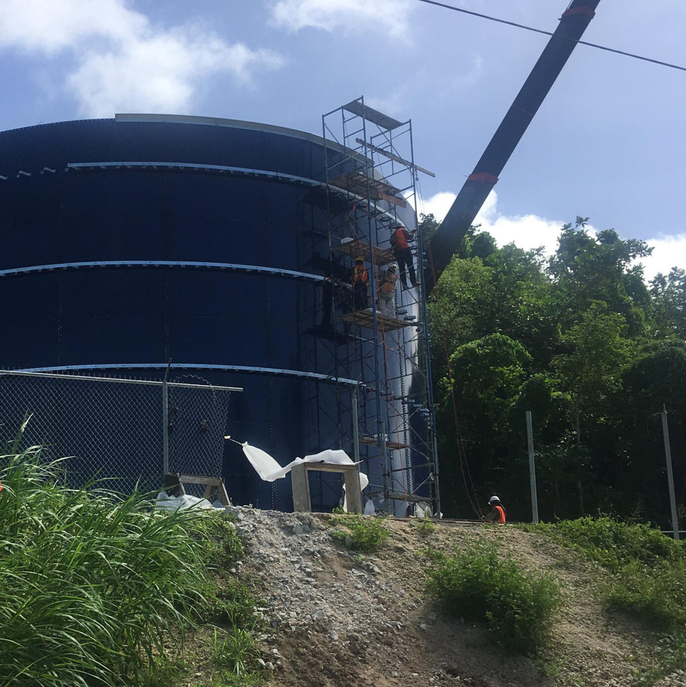 Blue Glass Fused to Steel Bolted Tank being installed on a hill